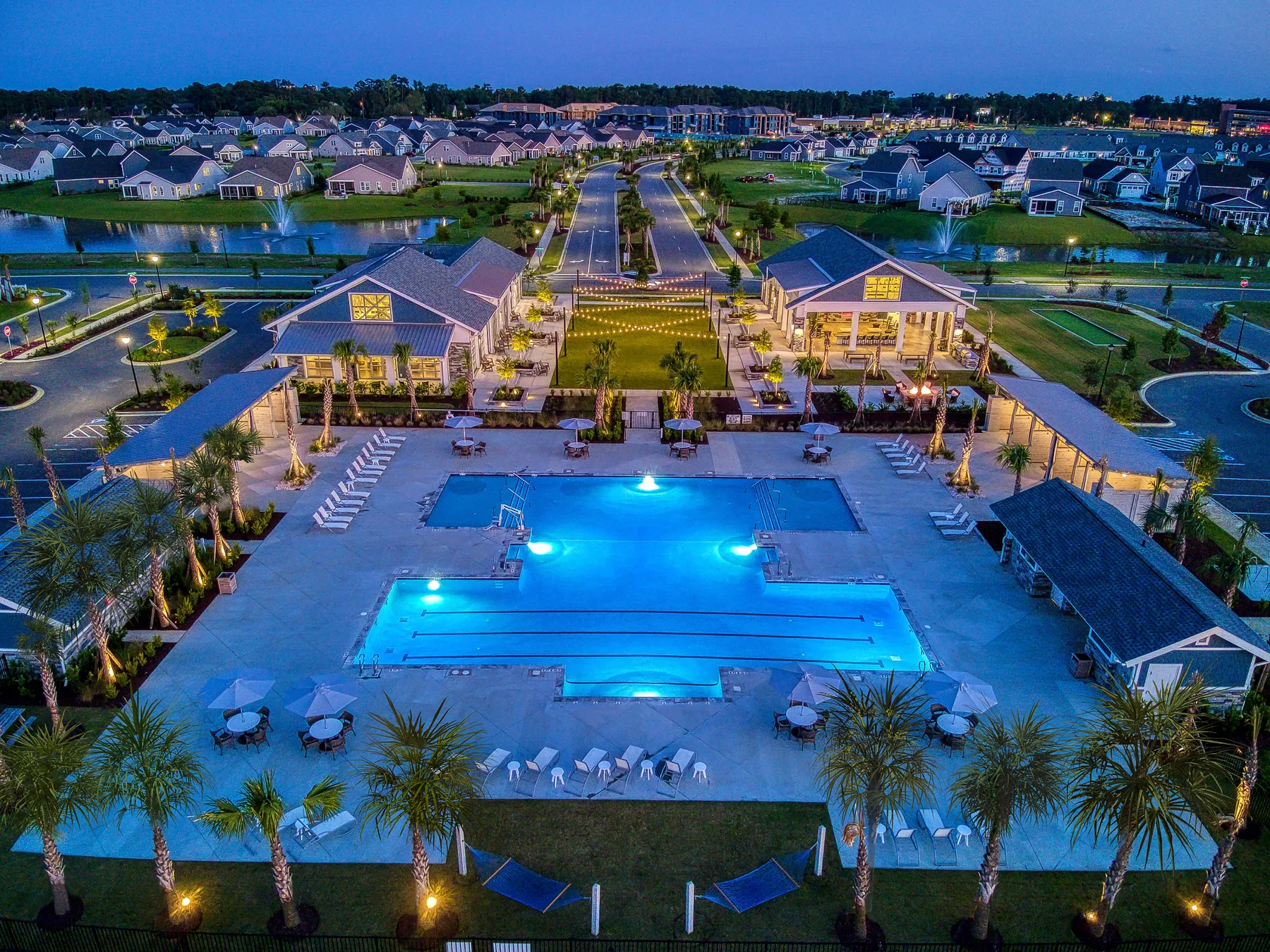 Nighttime resort pool after retouching