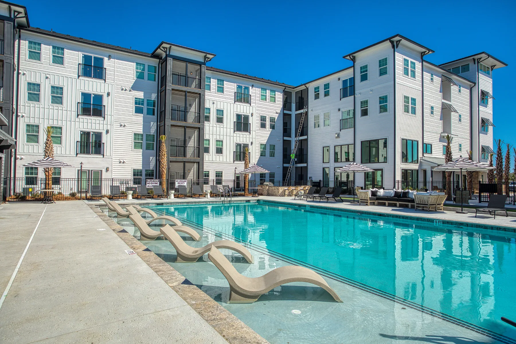 Resort pool exterior before retouching